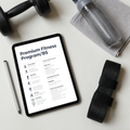 Balkan Programs digital fitness training guide flat lay with dumbbell and resistance bands
